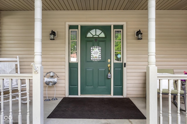 2872 N Prairie Stream Way, Columbus, IN 47203 - view of exterior entry featuring a porch