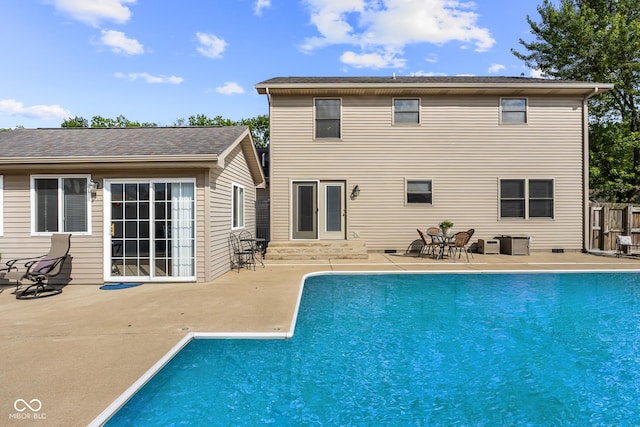2872 N Prairie Stream Way, Columbus, IN 47203 - back of property with a patio, an outdoor pool, and entry steps