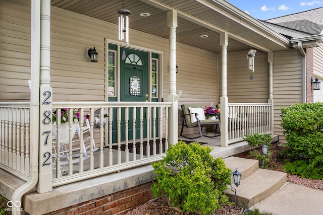 2872 N Prairie Stream Way, Columbus, IN 47203 - property entrance featuring covered porch and roof with shingles