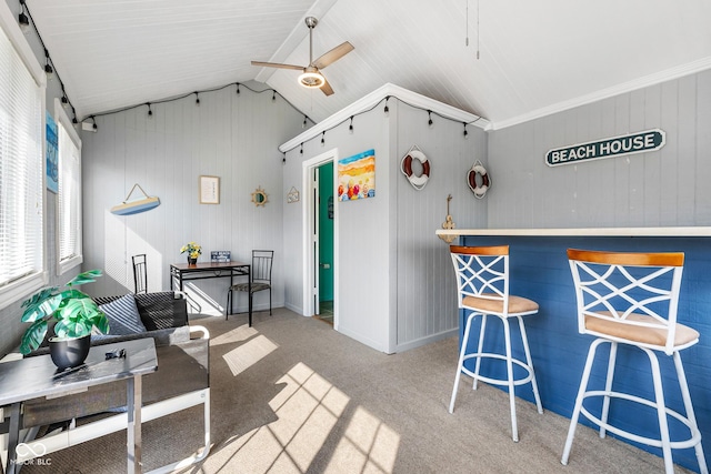 2872 N Prairie Stream Way, Columbus, IN 47203 - interior space with a ceiling fan, lofted ceiling, and wood walls