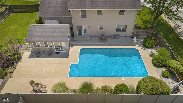 2872 N Prairie Stream Way, Columbus, IN 47203 - view of swimming pool with a patio, a fenced backyard, and an outbuilding