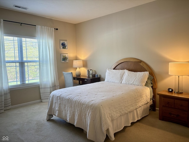 5932 Edelle Dr, Indianapolis, IN 46237 - bedroom featuring light colored carpet and baseboards
