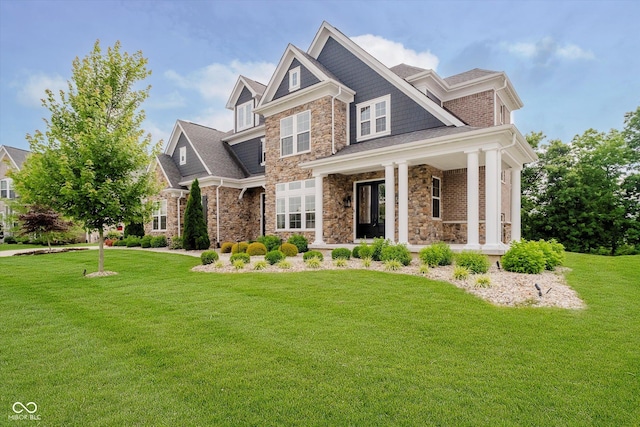 5706 Bentbrook Dr, Bargersville, IN 46106 - view of front of property featuring stone siding, covered porch, and a front yard