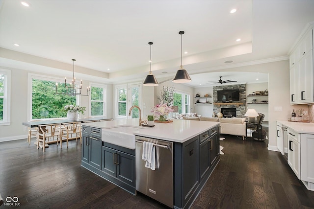 5706 Bentbrook Dr, Bargersville, IN 46106 - kitchen with dishwasher, a stone fireplace, white cabinetry, light countertops, and recessed lighting