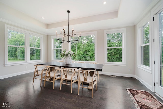 5706 Bentbrook Dr, Bargersville, IN 46106 - dining area featuring dark wood-style floors, a raised ceiling, a chandelier, recessed lighting, and crown molding