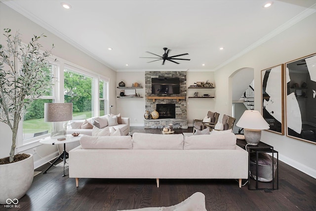 5706 Bentbrook Dr, Bargersville, IN 46106 - living area with ceiling fan, recessed lighting, dark wood-type flooring, a fireplace, and arched walkways