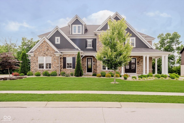 5706 Bentbrook Dr, Bargersville, IN 46106 - craftsman-style home with a front yard and stone siding