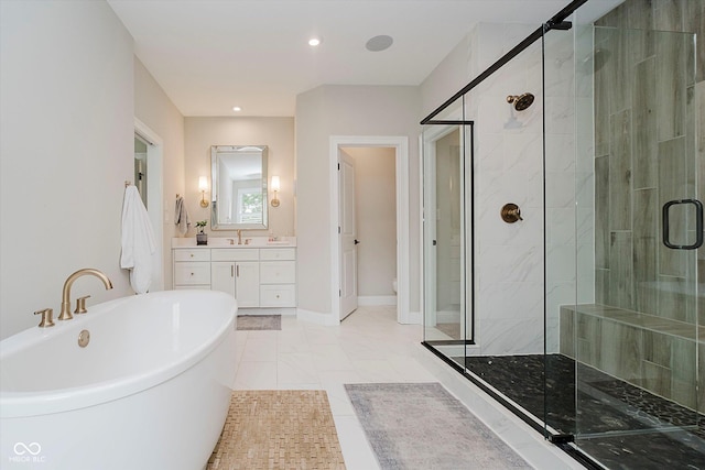 5706 Bentbrook Dr, Bargersville, IN 46106 - bathroom with a shower stall, a freestanding tub, vanity, and recessed lighting
