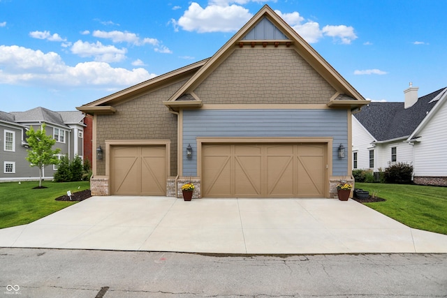 12839 Bird Cage, Carmel, IN 46032 - craftsman-style house with a front lawn, an attached garage, concrete driveway, and stone siding
