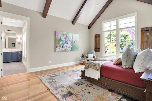 12839 Bird Cage, Carmel, IN 46032 - bedroom with light wood finished floors, beam ceiling, ensuite bathroom, and high vaulted ceiling
