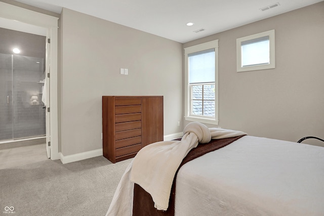 12839 Bird Cage, Carmel, IN 46032 - carpeted bedroom featuring multiple windows, recessed lighting, and ensuite bathroom