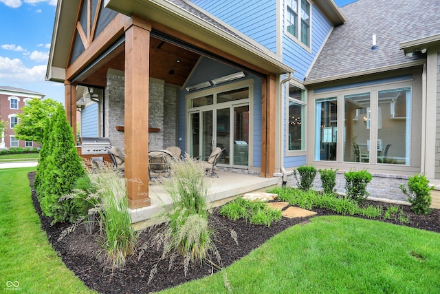 12839 Bird Cage, Carmel, IN 46032 - doorway to property with a patio, a shingled roof, and a lawn