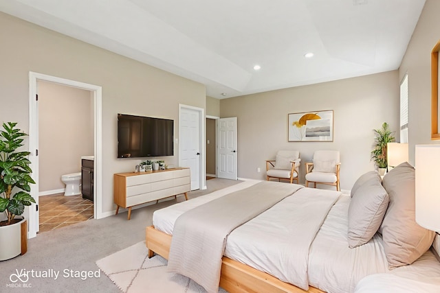 8115 Cole Wood Blvd, Indianapolis, IN 46239 - bedroom with recessed lighting, ensuite bathroom, light colored carpet, and light tile patterned floors