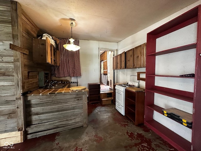 209 N Middle St, Spencer, IN 47460 - kitchen featuring white gas range oven, open shelves, concrete flooring, and hanging light fixtures