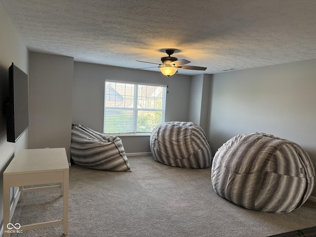 15961 Foothill Dr, Noblesville, IN 46060 - sitting room with carpet, a textured ceiling, and ceiling fan