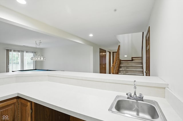 1326 Pebble Brook Dr, Noblesville, IN 46062 - kitchen featuring light countertops, recessed lighting, and hanging light fixtures