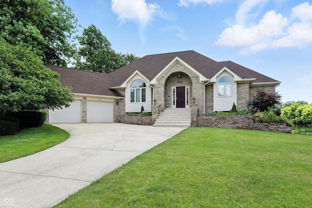 1326 Pebble Brook Dr, Noblesville, IN 46062 - view of front of home with a garage, a front yard, driveway, brick siding, and a shingled roof