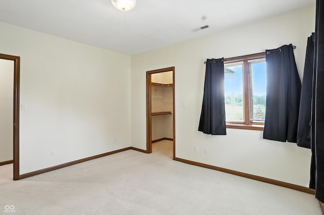 1326 Pebble Brook Dr, Noblesville, IN 46062 - unfurnished bedroom with light colored carpet, a spacious closet, and a closet