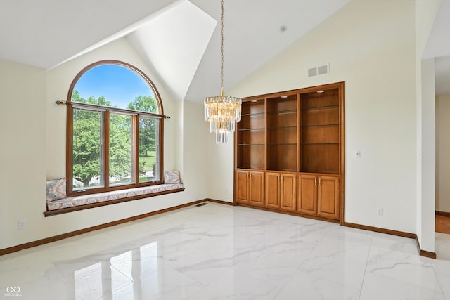 1326 Pebble Brook Dr, Noblesville, IN 46062 - unfurnished dining area with light marble finish floors, a chandelier, and vaulted ceiling