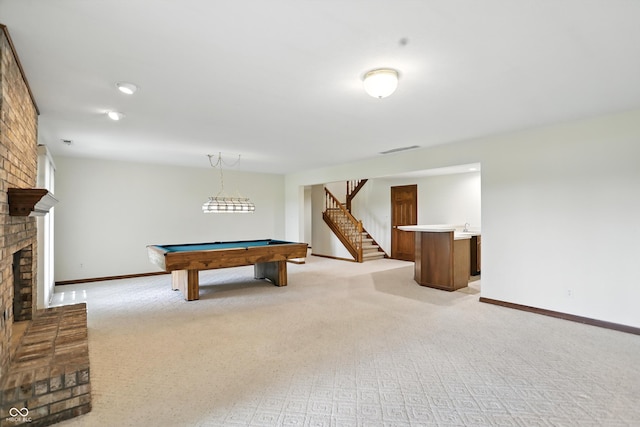 1326 Pebble Brook Dr, Noblesville, IN 46062 - playroom featuring light carpet, billiards, and a fireplace