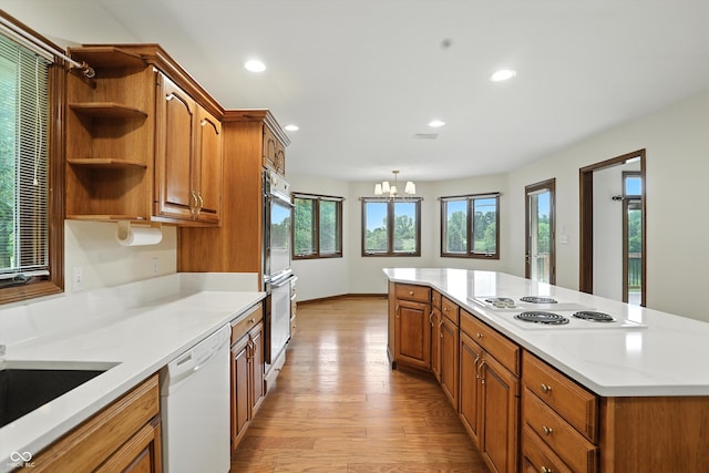 1326 Pebble Brook Dr, Noblesville, IN 46062 - kitchen featuring white appliances, open shelves, light wood-style floors, light countertops, and recessed lighting