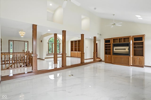 1326 Pebble Brook Dr, Noblesville, IN 46062 - unfurnished living room with a ceiling fan, marble tiled floors, decorative columns, arched walkways, and high vaulted ceiling
