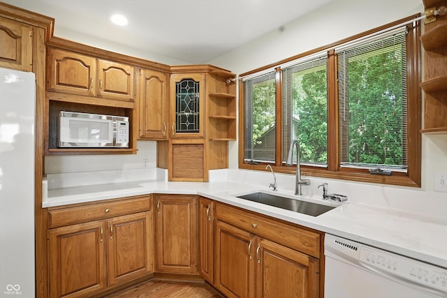 1326 Pebble Brook Dr, Noblesville, IN 46062 - kitchen featuring white appliances, open shelves, brown cabinetry, and light countertops