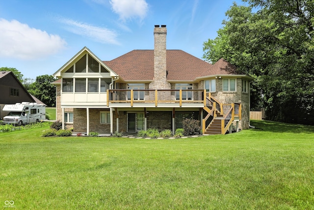 1326 Pebble Brook Dr, Noblesville, IN 46062 - rear view of property with a sunroom, a deck, a lawn, and stairs