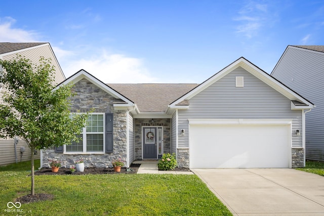 2421 Creek Bank Dr, Columbus, IN 47201 - view of front of property featuring stone siding, a front yard, driveway, and a shingled roof