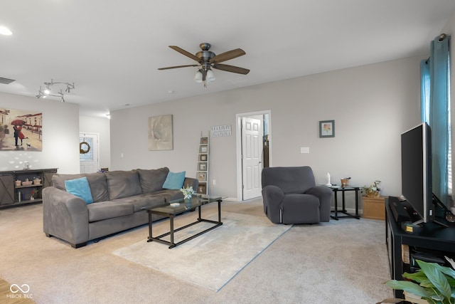 2421 Creek Bank Dr, Columbus, IN 47201 - living room featuring light colored carpet and ceiling fan