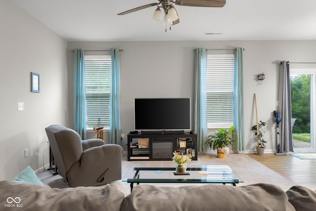 2421 Creek Bank Dr, Columbus, IN 47201 - living area with ceiling fan and wood finished floors