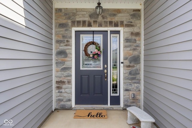 2421 Creek Bank Dr, Columbus, IN 47201 - doorway to property with stone siding
