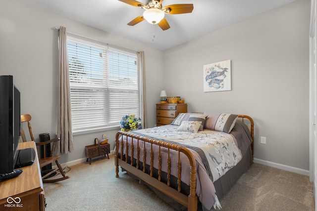 2421 Creek Bank Dr, Columbus, IN 47201 - bedroom featuring light colored carpet and a ceiling fan