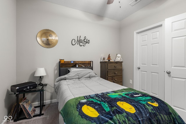 2421 Creek Bank Dr, Columbus, IN 47201 - carpeted bedroom featuring baseboards and a ceiling fan
