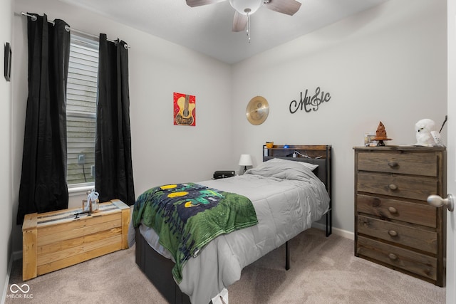 2421 Creek Bank Dr, Columbus, IN 47201 - bedroom featuring light carpet, multiple windows, and ceiling fan