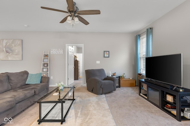 2421 Creek Bank Dr, Columbus, IN 47201 - living room with a ceiling fan and light carpet