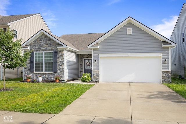 2421 Creek Bank Dr, Columbus, IN 47201 - craftsman-style house featuring stone siding, driveway, and a garage
