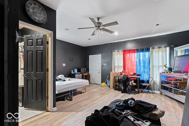 2610 Caroline Ave, Indianapolis, IN 46218 - bedroom featuring wood finished floors and recessed lighting