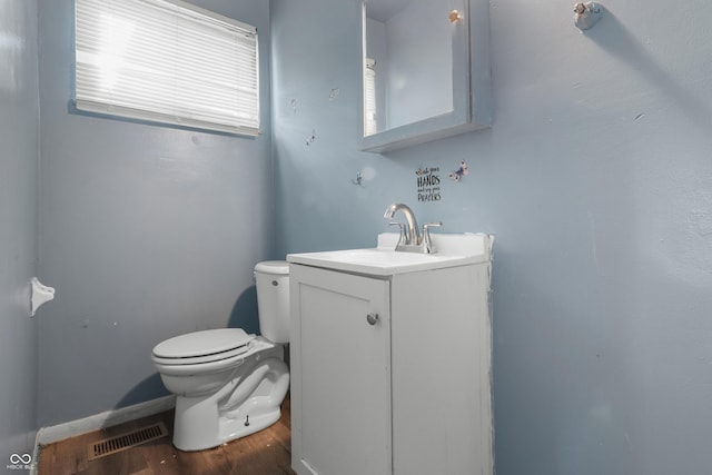 2610 Caroline Ave, Indianapolis, IN 46218 - bathroom with vanity and wood finished floors