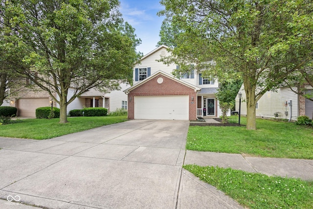 2289 Salem Park Dr, Indianapolis, IN 46239 - view of front of property with an attached garage, driveway, brick siding, and a front lawn