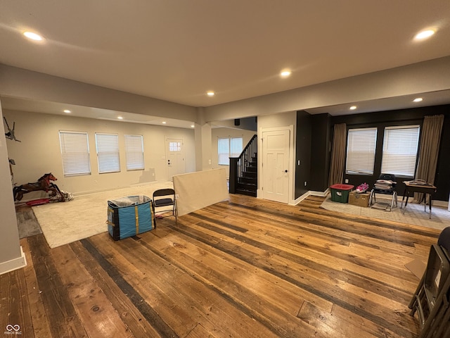917 N Rural St, Indianapolis, IN 46201 - living room with wood-type flooring, stairs, and recessed lighting