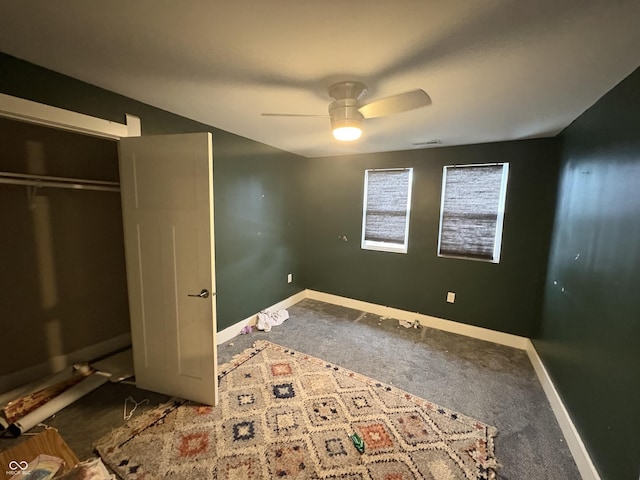 917 N Rural St, Indianapolis, IN 46201 - unfurnished bedroom featuring carpet, a ceiling fan, and a closet