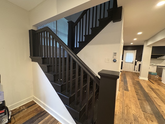 917 N Rural St, Indianapolis, IN 46201 - staircase with hardwood / wood-style flooring and recessed lighting