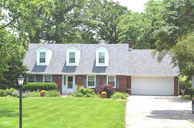 3115 E 400 S, Anderson, IN 46017 - new england style home featuring brick siding, an attached garage, a front lawn, concrete driveway, and a shingled roof