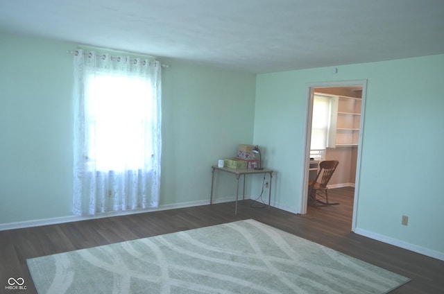 3115 E 400 S, Anderson, IN 46017 - bedroom featuring multiple windows, wood finished floors, and a spacious closet