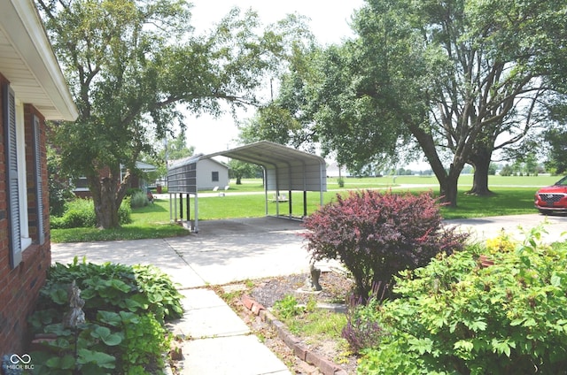 3115 E 400 S, Anderson, IN 46017 - view of patio with a detached carport and driveway