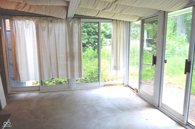 3115 E 400 S, Anderson, IN 46017 - unfurnished sunroom with unfinished concrete floors