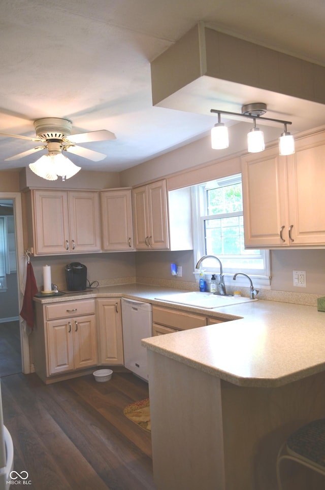 3115 E 400 S, Anderson, IN 46017 - kitchen with a peninsula, dishwasher, light countertops, dark wood-style flooring, and a ceiling fan