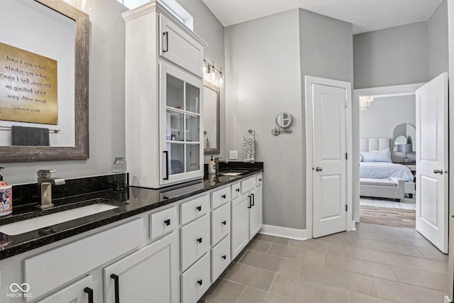 2105 Granville Dr, Westfield, IN 46074 - ensuite bathroom with double vanity and tile patterned flooring