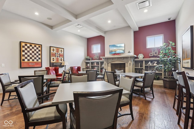 2105 Granville Dr, Westfield, IN 46074 - dining area featuring hardwood / wood-style flooring, a fireplace, beam ceiling, plenty of natural light, and coffered ceiling